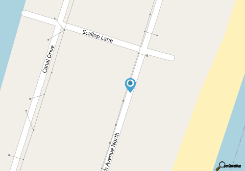 This first floor unit/second row home sits just across the street from a beach! map location