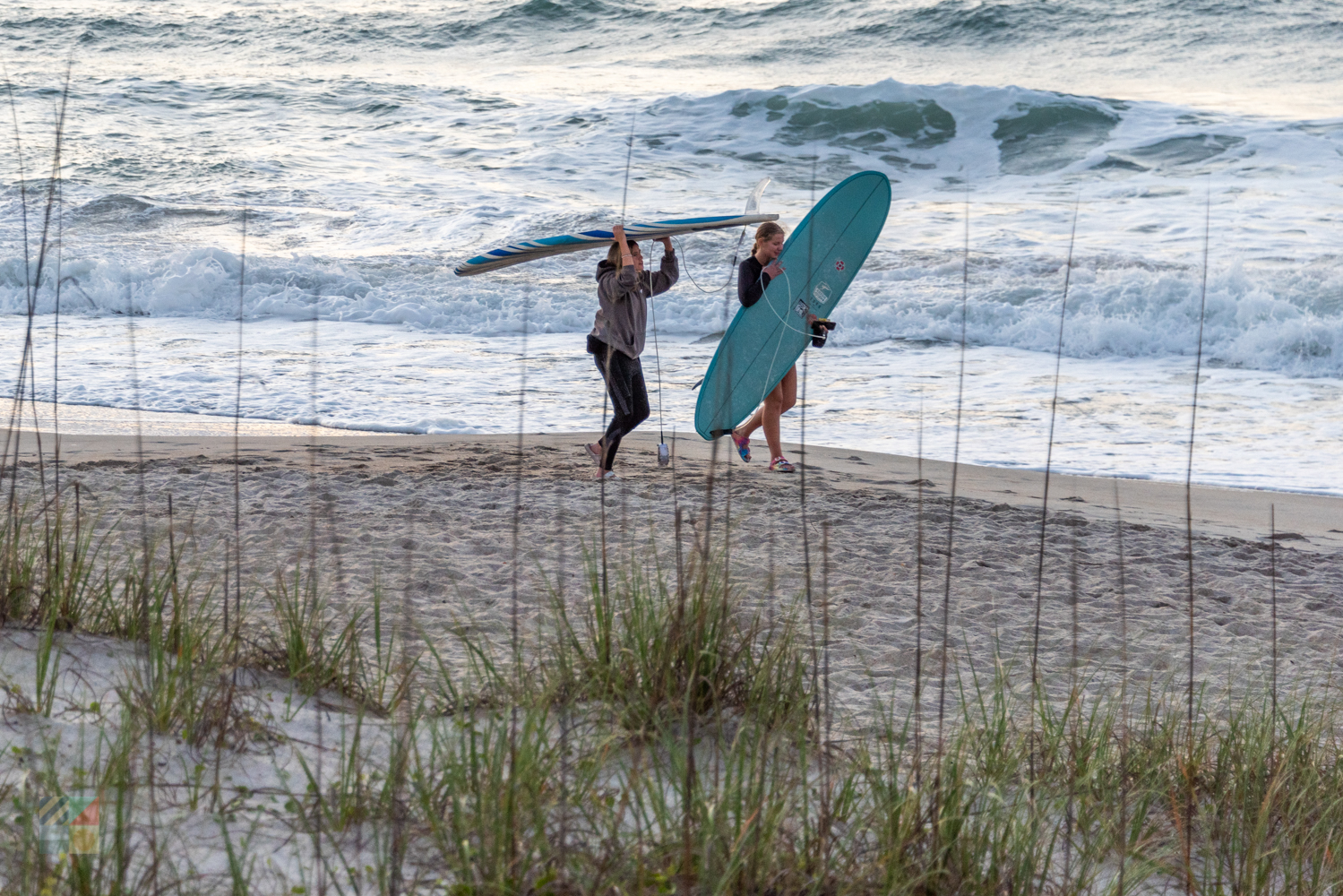 Surfers in Wrightsville Beach