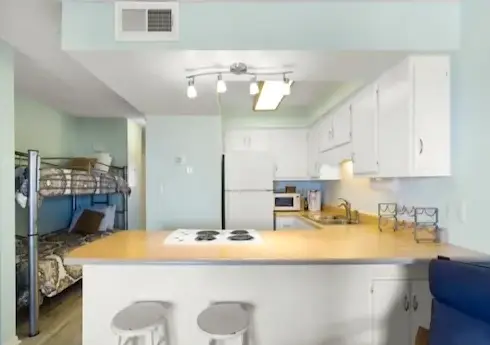 Pura Vida Pure Life - Expansive views of the ocean and wide sandy beach by RedAwning