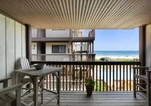 Pura Vida Pure Life - Expansive views of the ocean and wide sandy beach by RedAwning